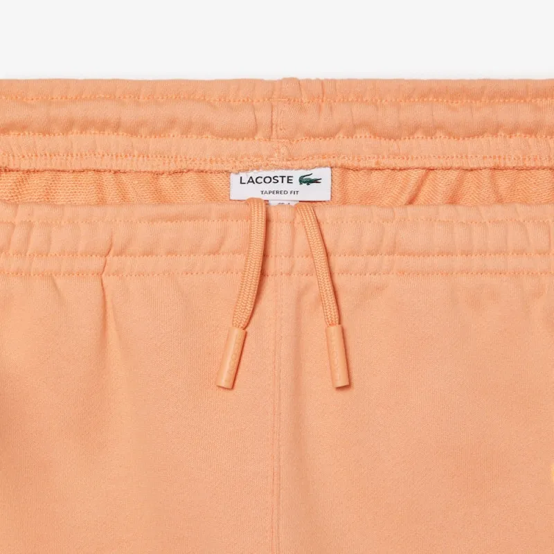 PANTALON DE SURVÊTEMENT HOMME COUPE FUSELÉE INSCRPITION LACOSTE ORANGE