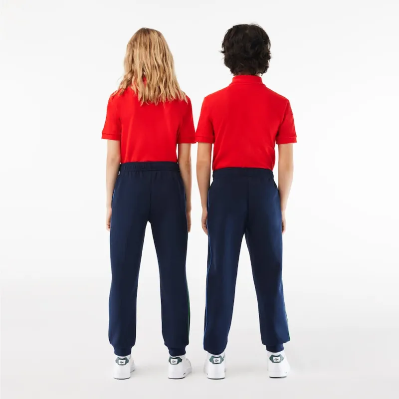 PANTALON DE SURVÊTEMENT LACOSTE ENFANT BLEU MARINE AVEC FINITIONS CONTRASTÉES