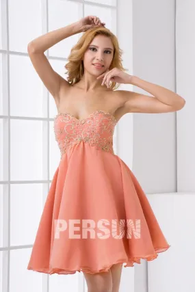 Robe de soirée rose saumon courte bustier empire ligne A brodée